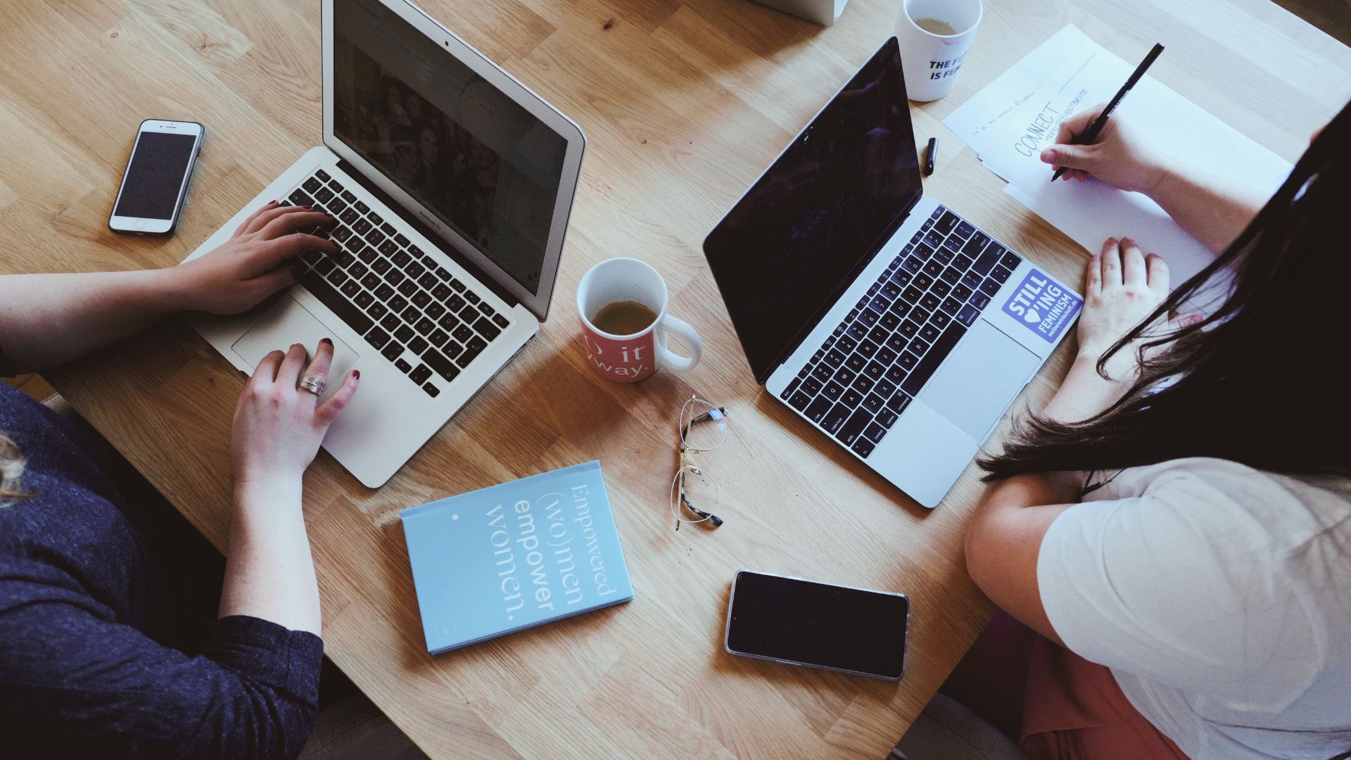 Person working from home as a Virtual Assistant, using digital tools to manage tasks.